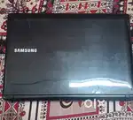 Samsung Laptop (Not Working) + Original Charger – For Parts