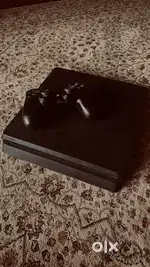 ( PS4 SLIM) 1 TB with Controller with 2 games