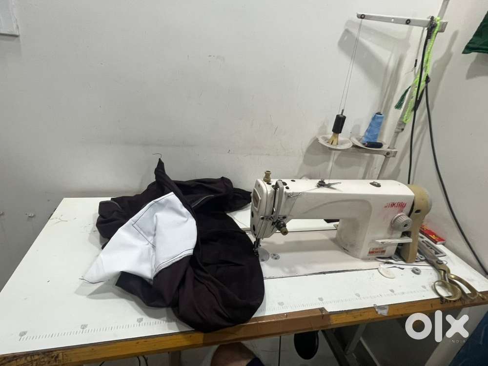 Jhuki akari machine tailor