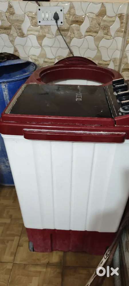 Whirlpool 10kg machine mehroon in colour with big tub and drier