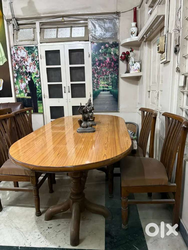 Dinning table 4 seater & 2 sofa chairs leather good condition