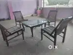 Wooden central table, glass top with chairs