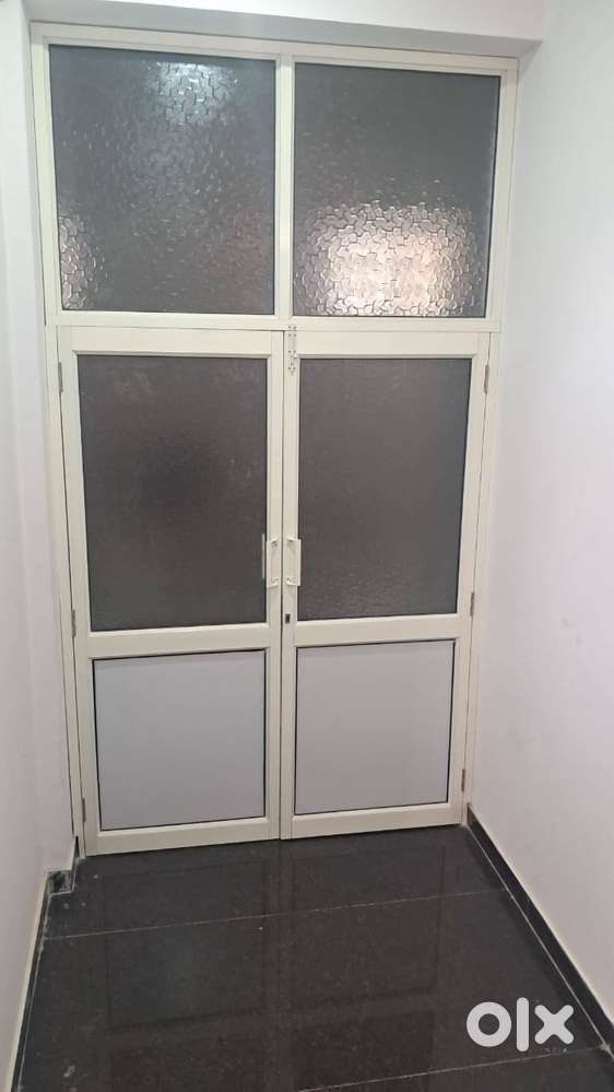 basement office with essential amenities, suitable for official or com