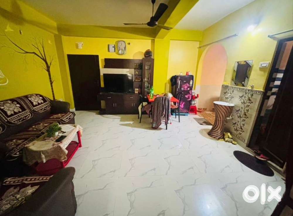 একদম বারাসত পাইনিওর পুকুর আর মাঠ এর একদম মিডিল এ পুজো মন্ডম এর সামনে