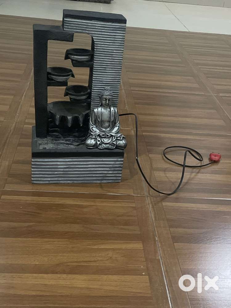 A well condition working buddha design waterfall