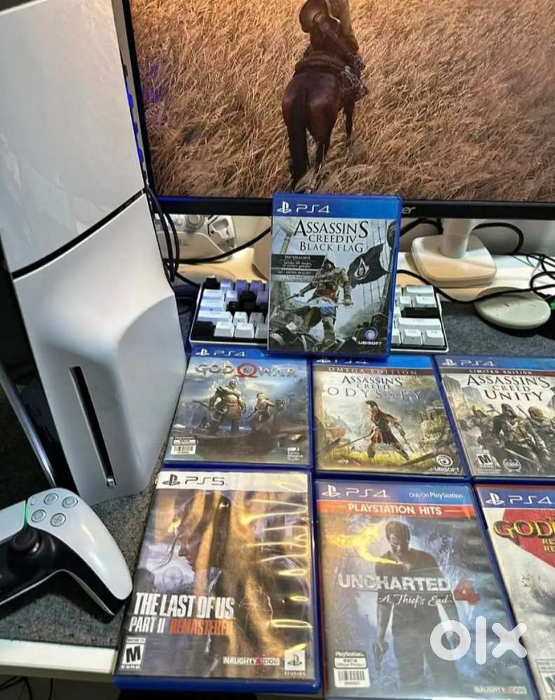 Sony PlayStation 5 Slim 1TB PS5 . One controller and Games.