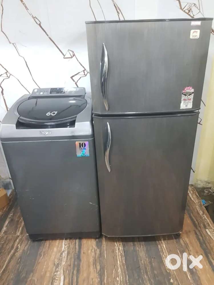Godrej double door refrigerator and whirlpool top load washing machine