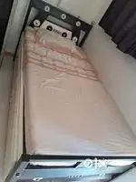 Single bed with bed cover