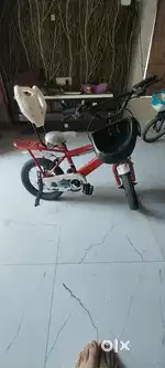 1 small size bicycle and 1 midieam size bicycle