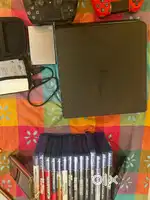 Ps 4 slim with 15 games 2 tb hard drive, hard drive case, 2 controller