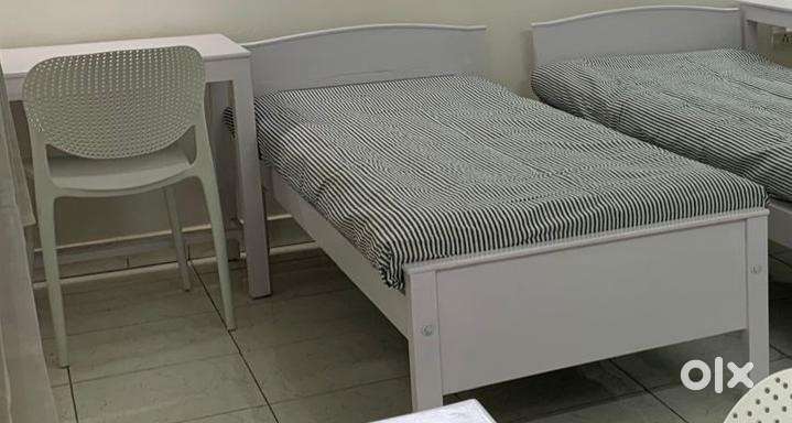 Single cot and table for sale