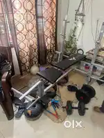All in one gym machine argent sell with set of dumbles due to family