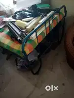 लोखंडी पलंग