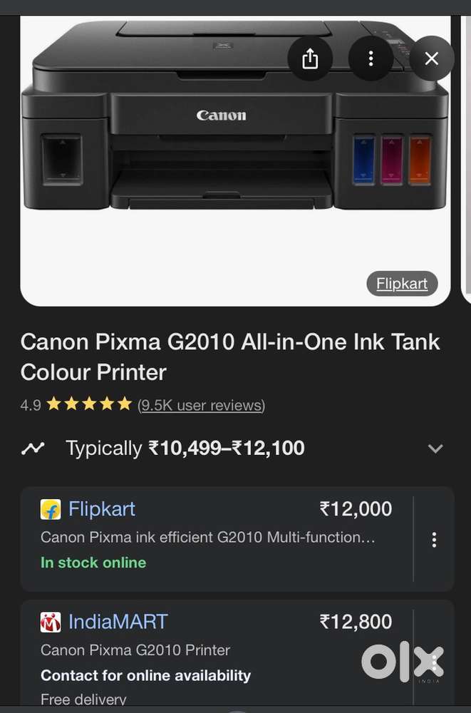 Canon G2000 liquid ink scan/printer.  low cost of print.Good condition