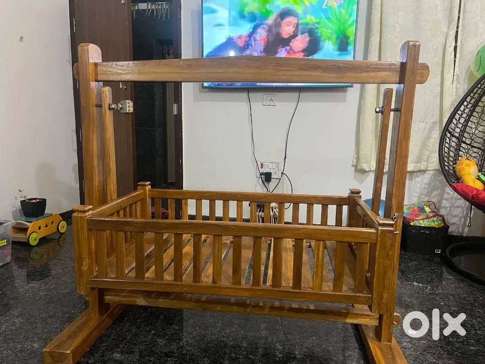 Teak wood cradle