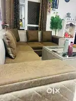 Sofa with 8 seat along with glass table ...Sofa is neat and clean