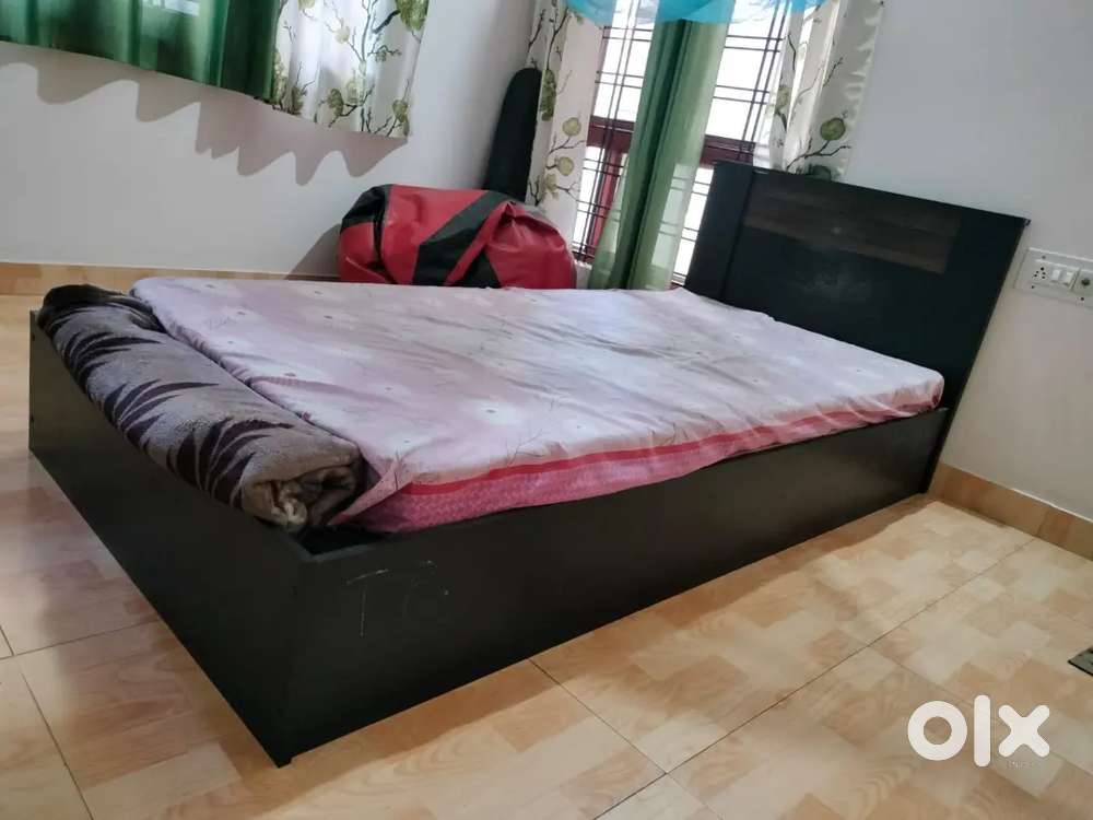 Two single cots with new mattress