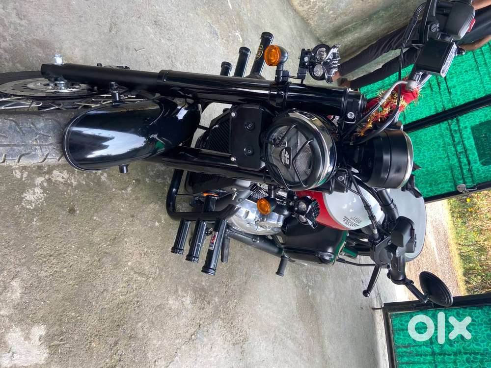 The Jawa 42 Bobber in Jasper Red is a stylish, single-seat lifestyle