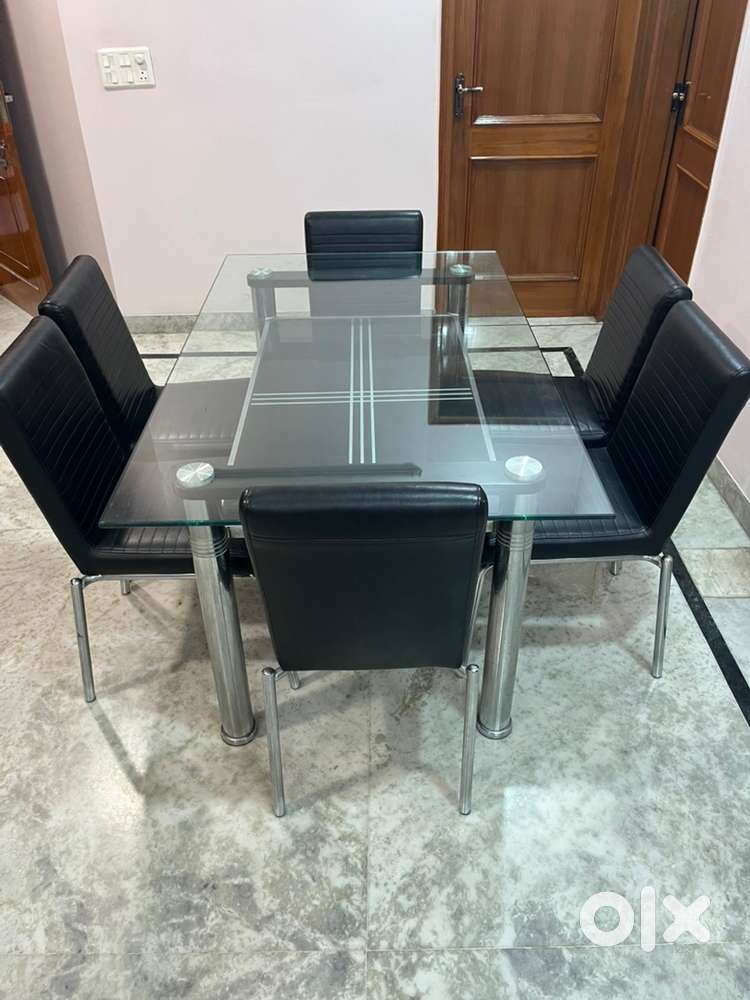 Dining glass table with glass shelf and six chairs