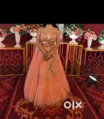 Latest trendy bright peachy lehanga perfect for any occassion