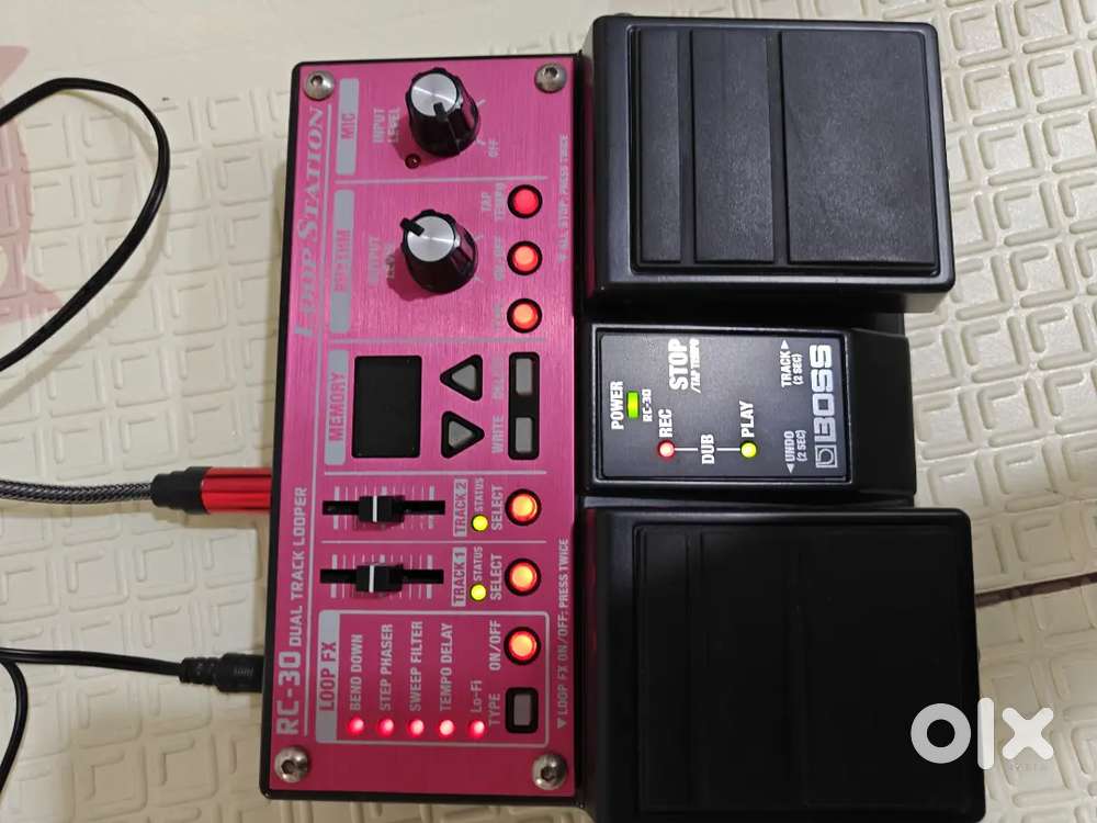 Boss RC30 Dual track Looper stationfor guitar with mic input as well.