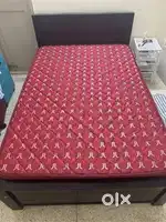Double bed (6x4 ft) with a Duroflex mattres and an IKEA bedside table