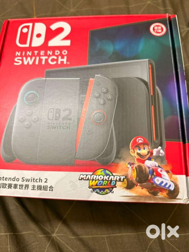 Nintendo Switch 2 + Mario Kart World (Brand New) Red and Blue Joy