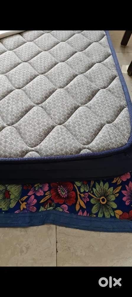Mildly used Queen Size Mattress with waterproof cover