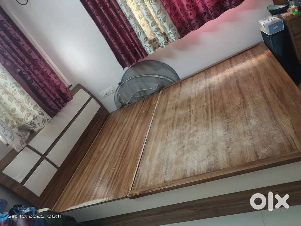 Queen size cot with storage