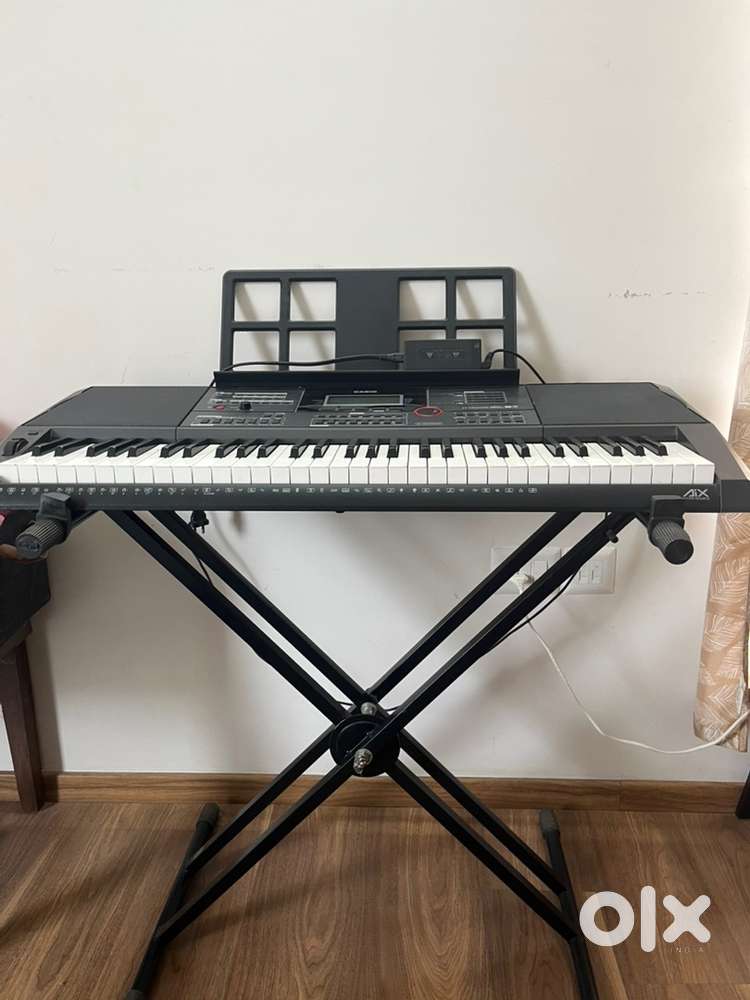 Casio keyboard with stand and cover