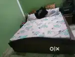 King size double bed with corner drawer table