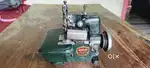 Seving workloc machine working condition with all accesories and Table