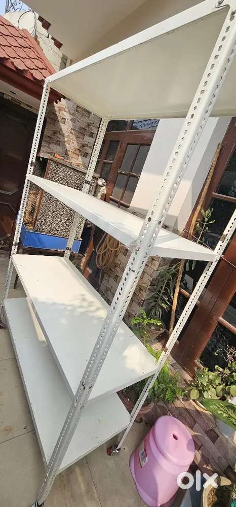 Heavy white IRON RACK ,in built wheels