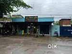 Commercial land with shops and building for sale