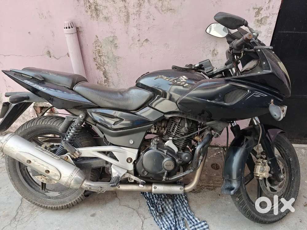 Black colour Bajaj 220 in very good condition.