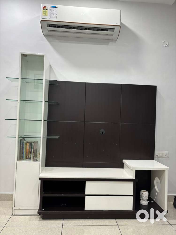 TV Unit with Storage and Glass Display Shelves in Good Condition