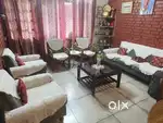 Premium wooden sofa set crafted for sophisticated living room décor