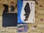 Playstation 4 slim 1TB with 2 controllers and 10+ games