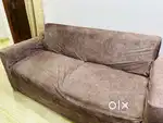 8 seater sofa set with square centre table along with 2 puffies