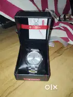 Titan watch 1 MONTH OLD