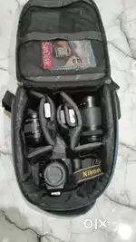 Nikon D3400 DSLR camera with an AF-P DX Nikkor 18-55mm f/3.5-5.6G VR