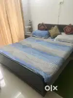 Sheesham wood double bed with cotton mattress. Along with two bed side