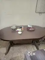 Six seater wooden dining table