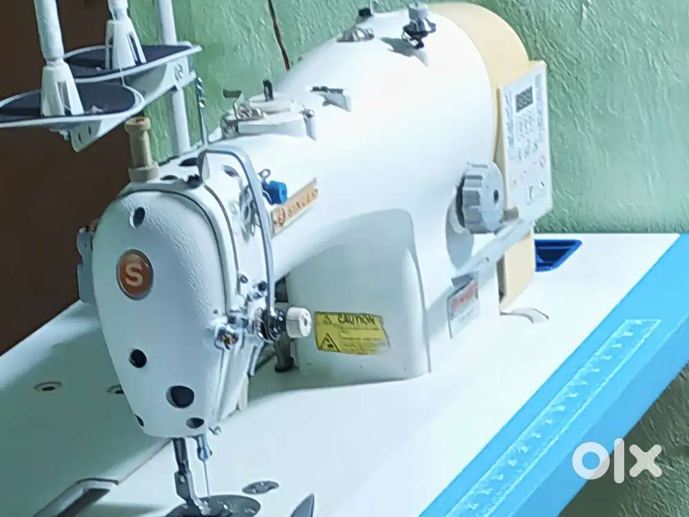 Singer auto cutter auto lock machine