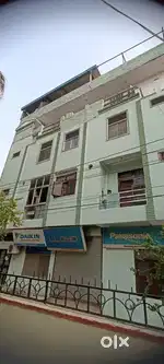House on rent with three shops ,corner, garden facing, running rent