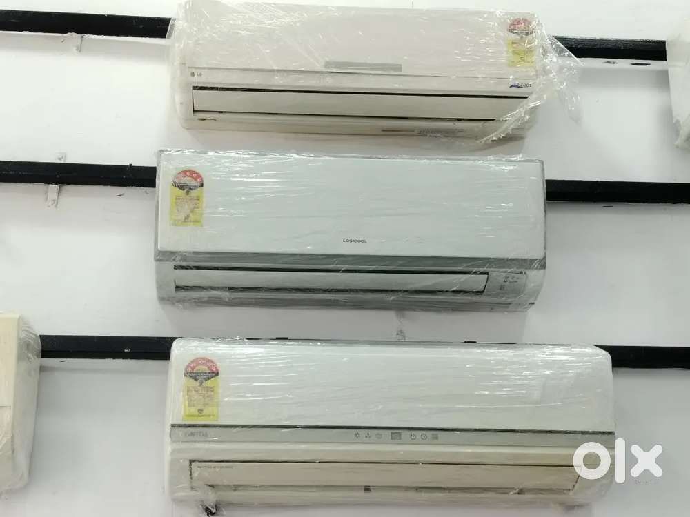 1, ton split AC good condition with warranty 1 year old