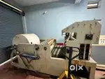 Paper cup punching and die cutting machine
