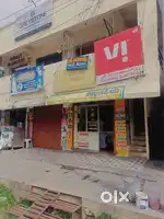 Building with land for sale