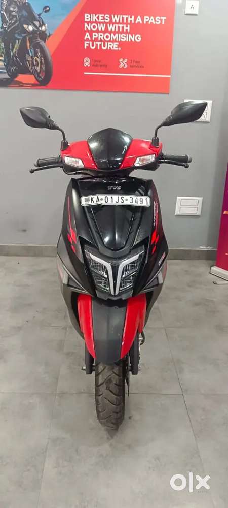 Ntorq race edition one year warranty along with 3 free service