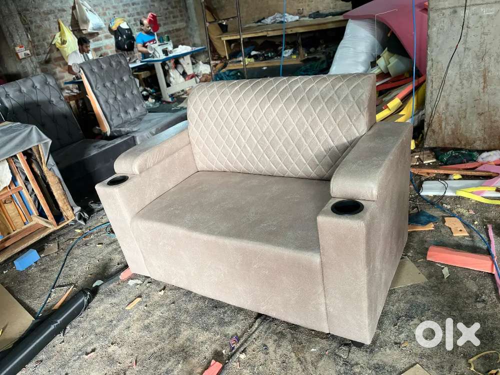 2 setter sofa set with cup holder only available in Starf furniture